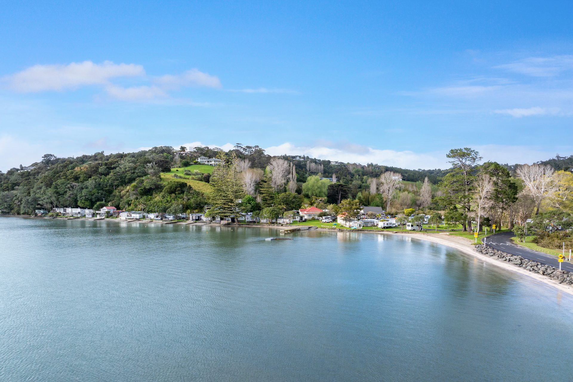 Beachfront cabins along the Sandspit shoreline
